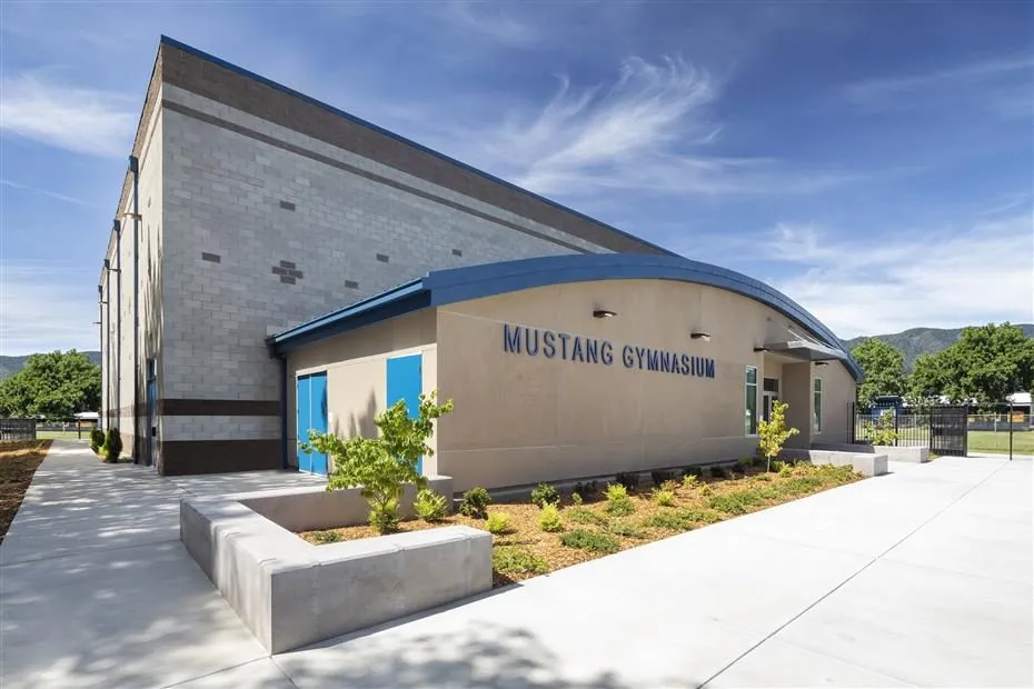 Exterior with Mustang Gymnasium lettering