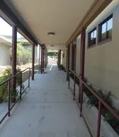 Covered walkway along the classrooms